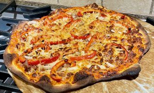 Burnt Pizza Ready to be Cut 20210103.jpeg